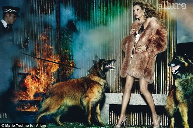 Smouldering: Kate Moss sizzles in a cover shoot for Allure magazine as she poses in fur with dogs