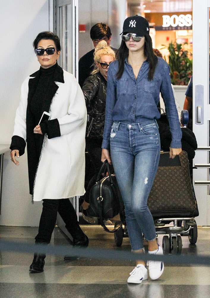 kendall-jenner-double-denim-may-2015-at-jfk-airport-getty-gallery  large