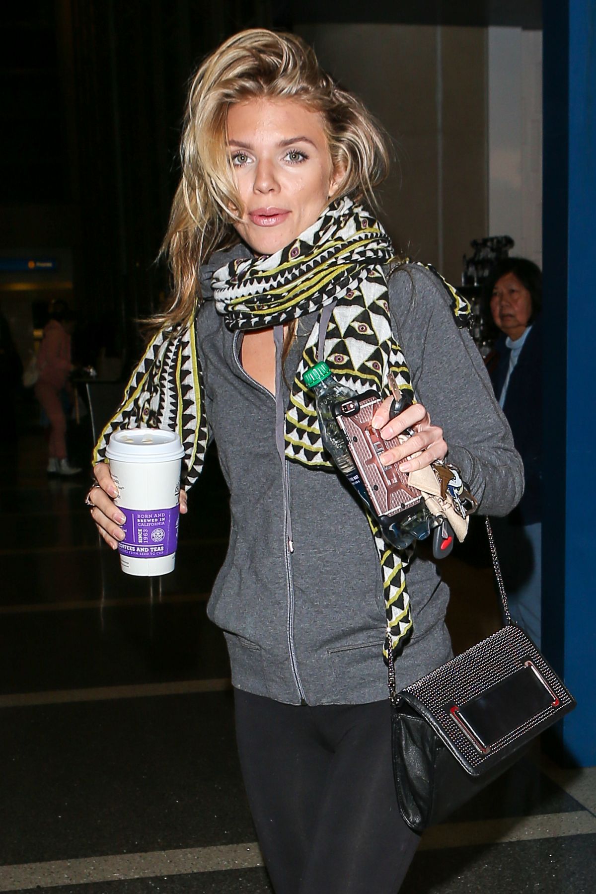 annalynne-mccord-stays-comfy-in-bright-patterned-scarf-and-hoodie-as-she-jets-out-of-lax_1-1