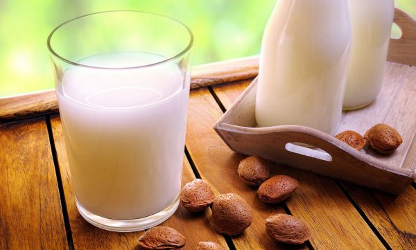 bigstock-Glass-Of-Almond-Milk-On-A-Tabl-83478887