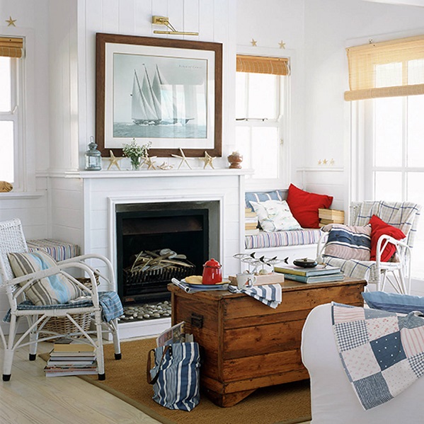 New England beach house seaside style. White living room, bamboo blinds, painted furniture, window seat, stripy cushions, wicker chairs, chest. Starfish, nautical painting Sim Used IH 07/2005 p22