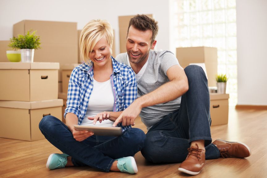 Couple-researching-furniture-in-an-empty-house