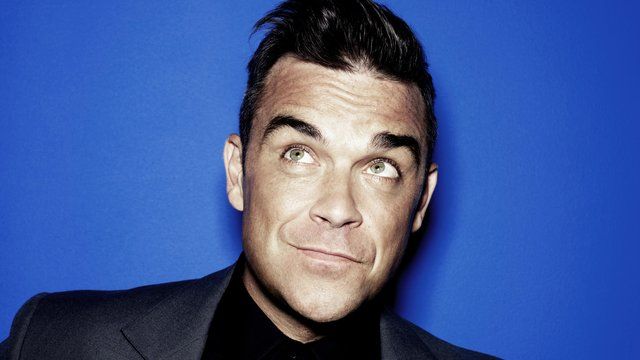 robbie-williams-press-shot-2013-1370363715-list-handheld-0