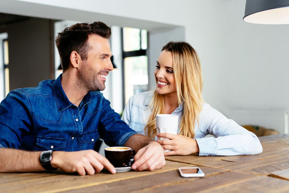 photodune-12654168-happy-couple-talking-at-cafe-s