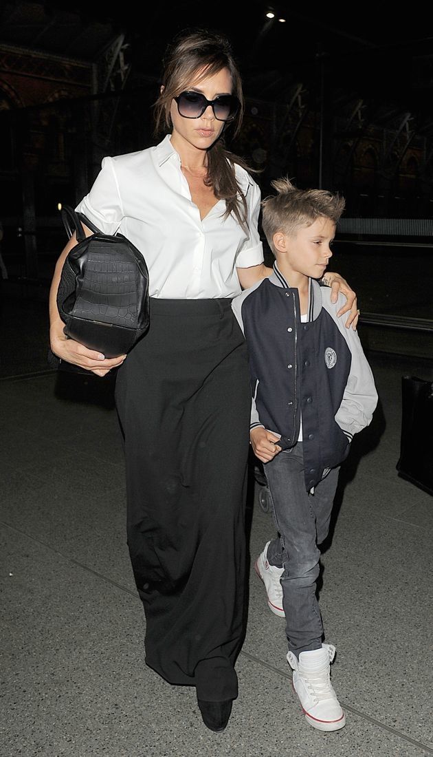 Victoria-Beckham-and-Romeo-Beckham-arrive-at-Kings-Cross-St-Station-London